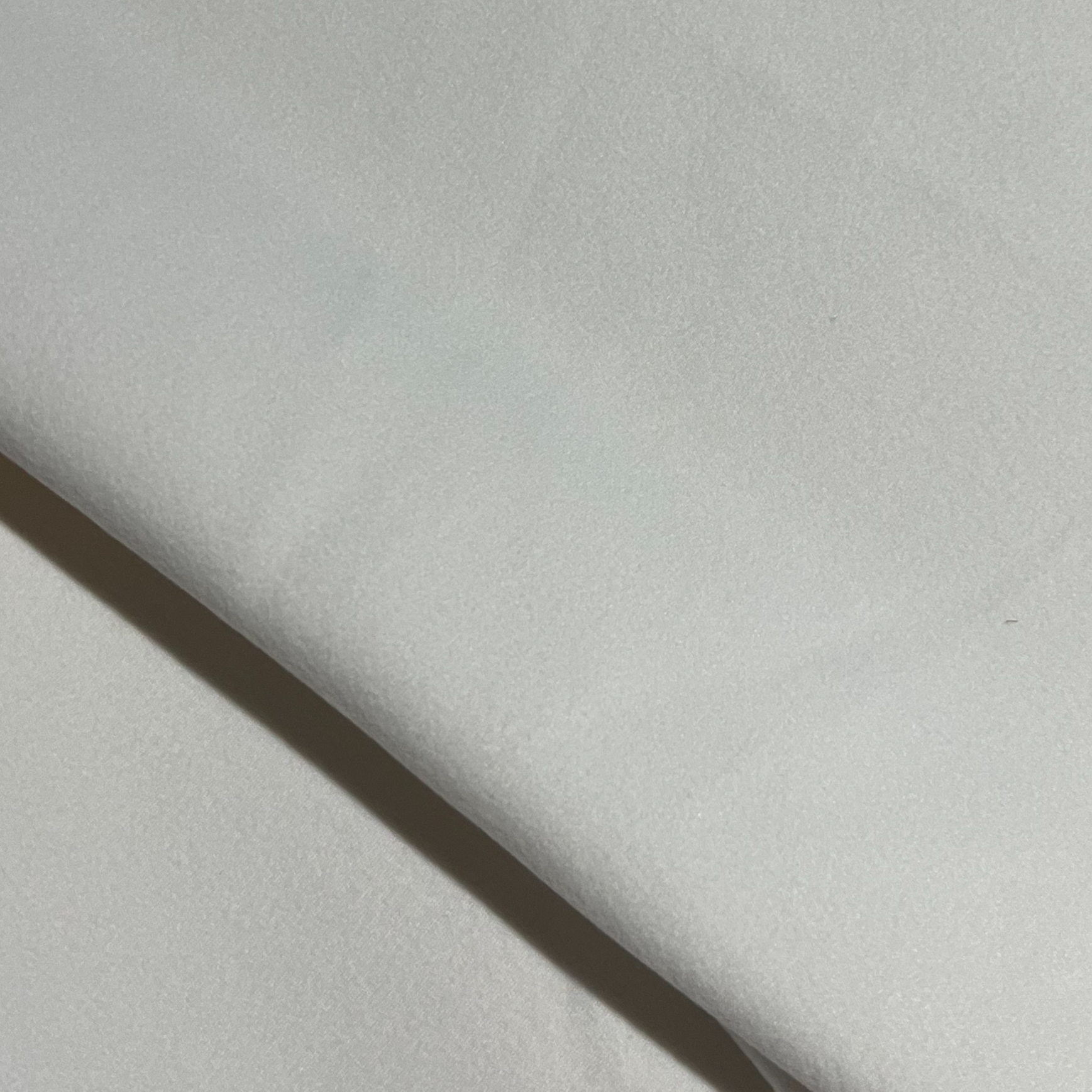 炫彩双面象牙白色绒布料柔软舒适保暖自发热不起球底衫面料