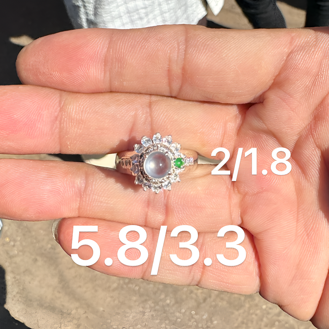 1130(小哪吒在源头)玻璃种翡翠正圆黑钢戒面干净肉细荧光足M25