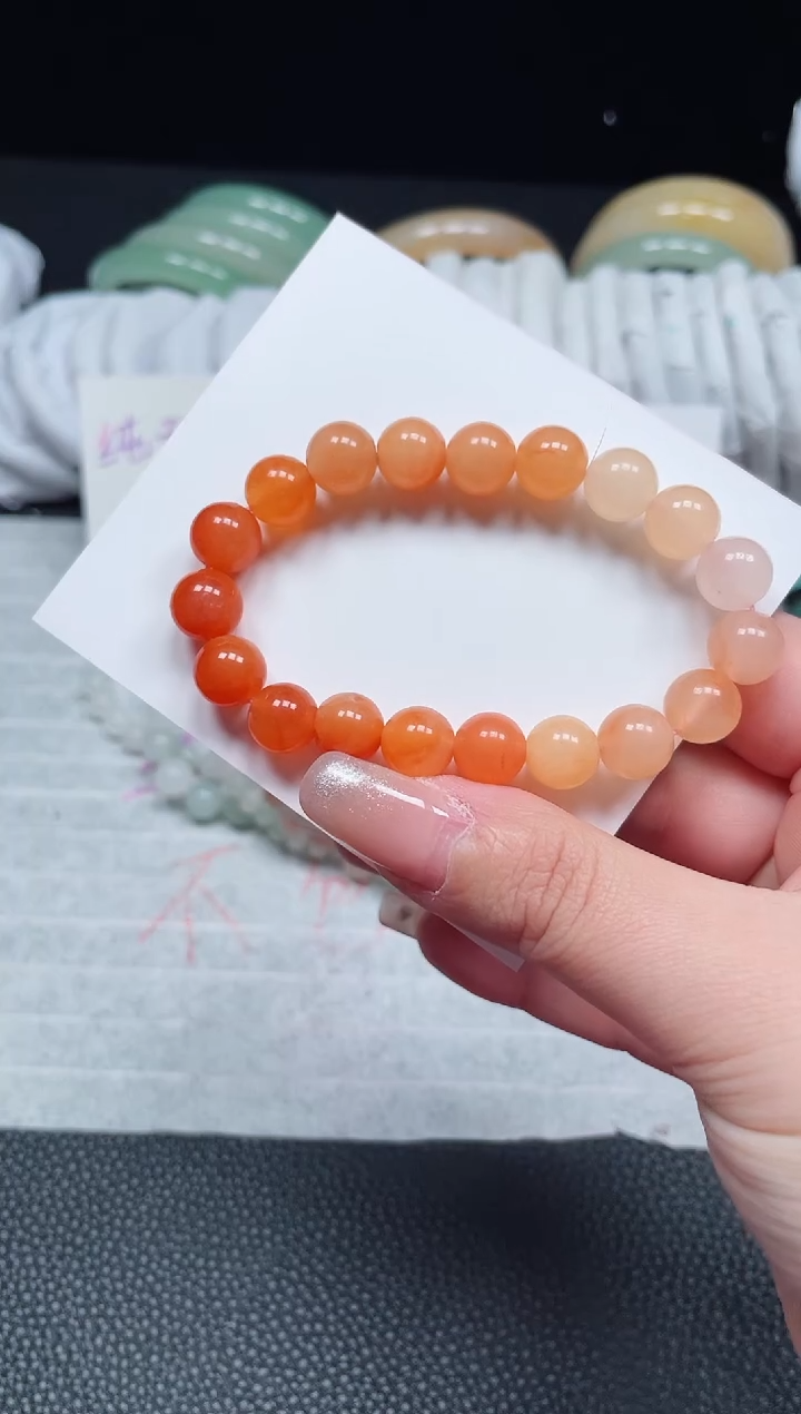 【闪购商品】石英质玉手镯未镶嵌柿子红卡