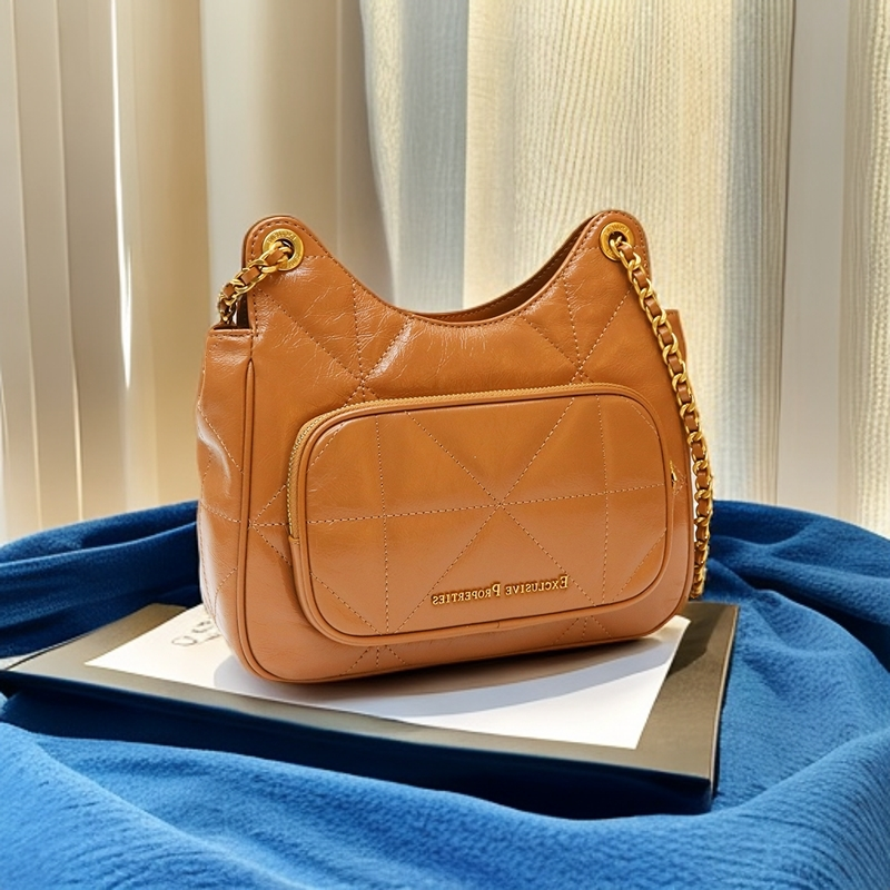 新款时尚牛皮单肩斜跨包百搭23C0695