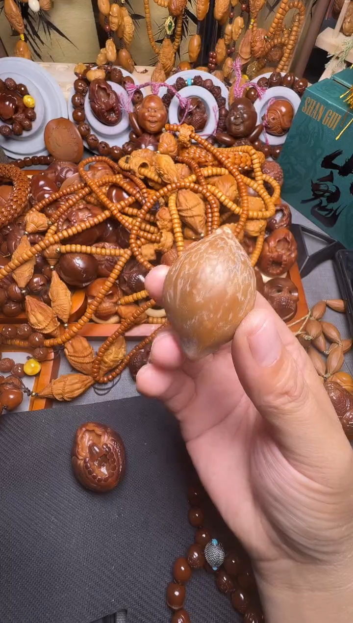 手串橄榄核赵*?素核一个