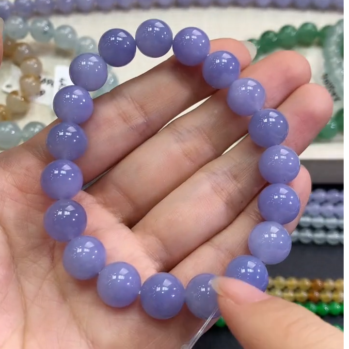 翡翠手串未镶嵌D59 紫货有色差  总价：58000  尾款28000