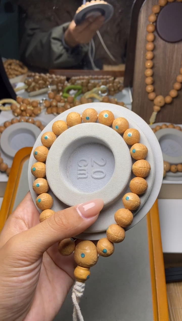 吊坠凤眼菩提12凤眼松钉手串