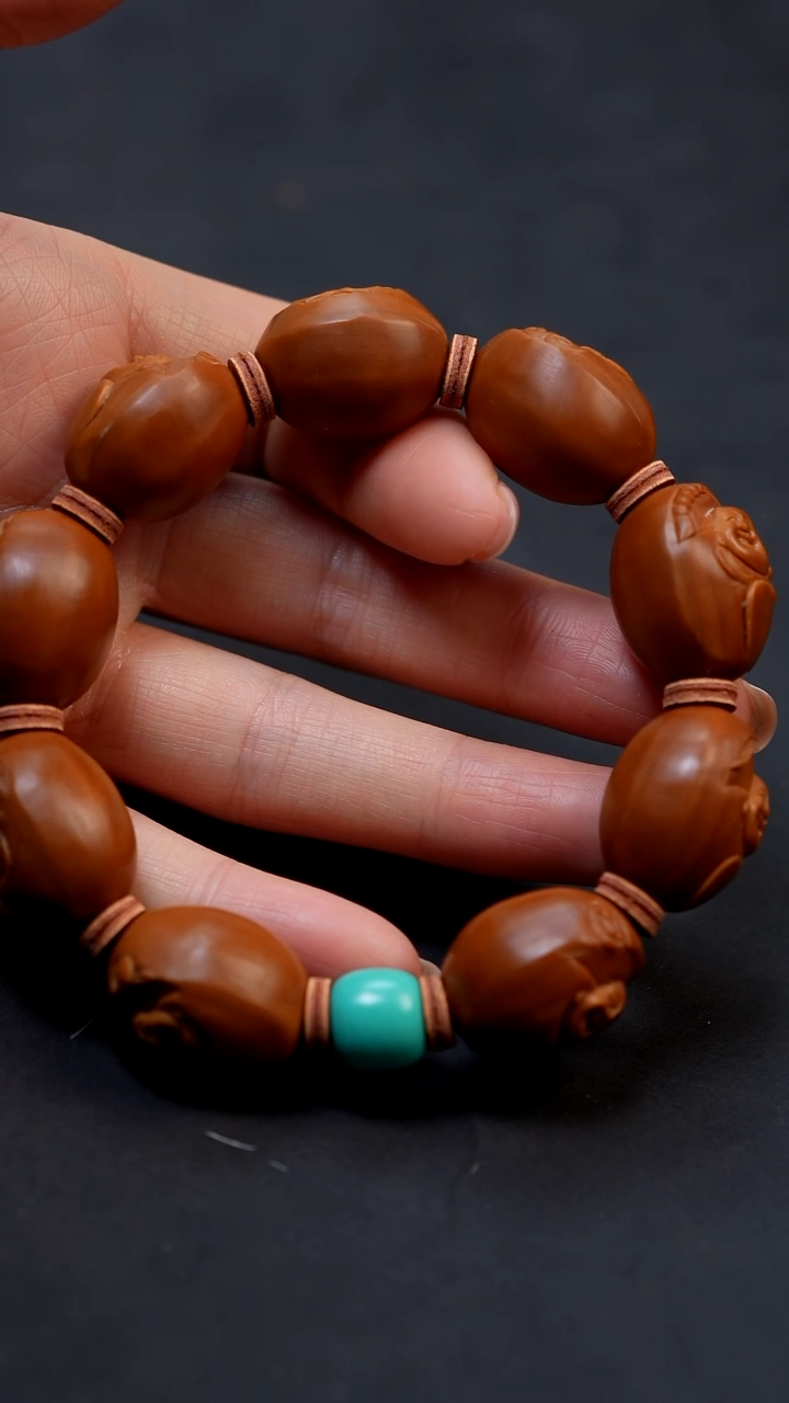 【闪购商品】橄榄核手串浮雕弥勒