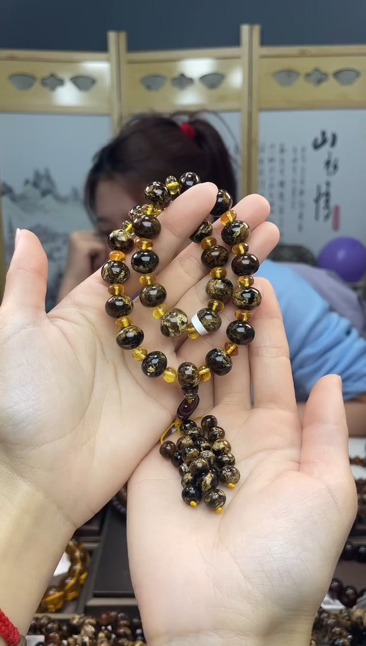 【闪购商品】琥珀裸石未镶嵌熊猫花手持11-12