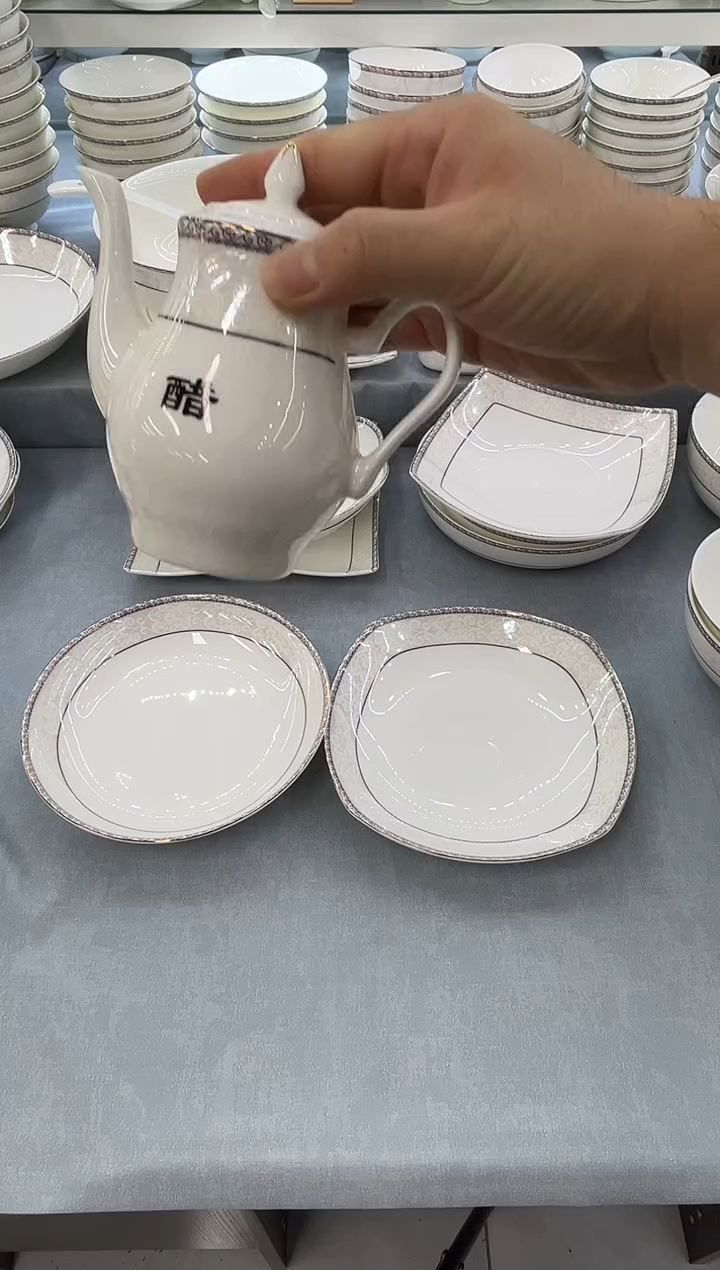 骨瓷玲珑醋壶1个 