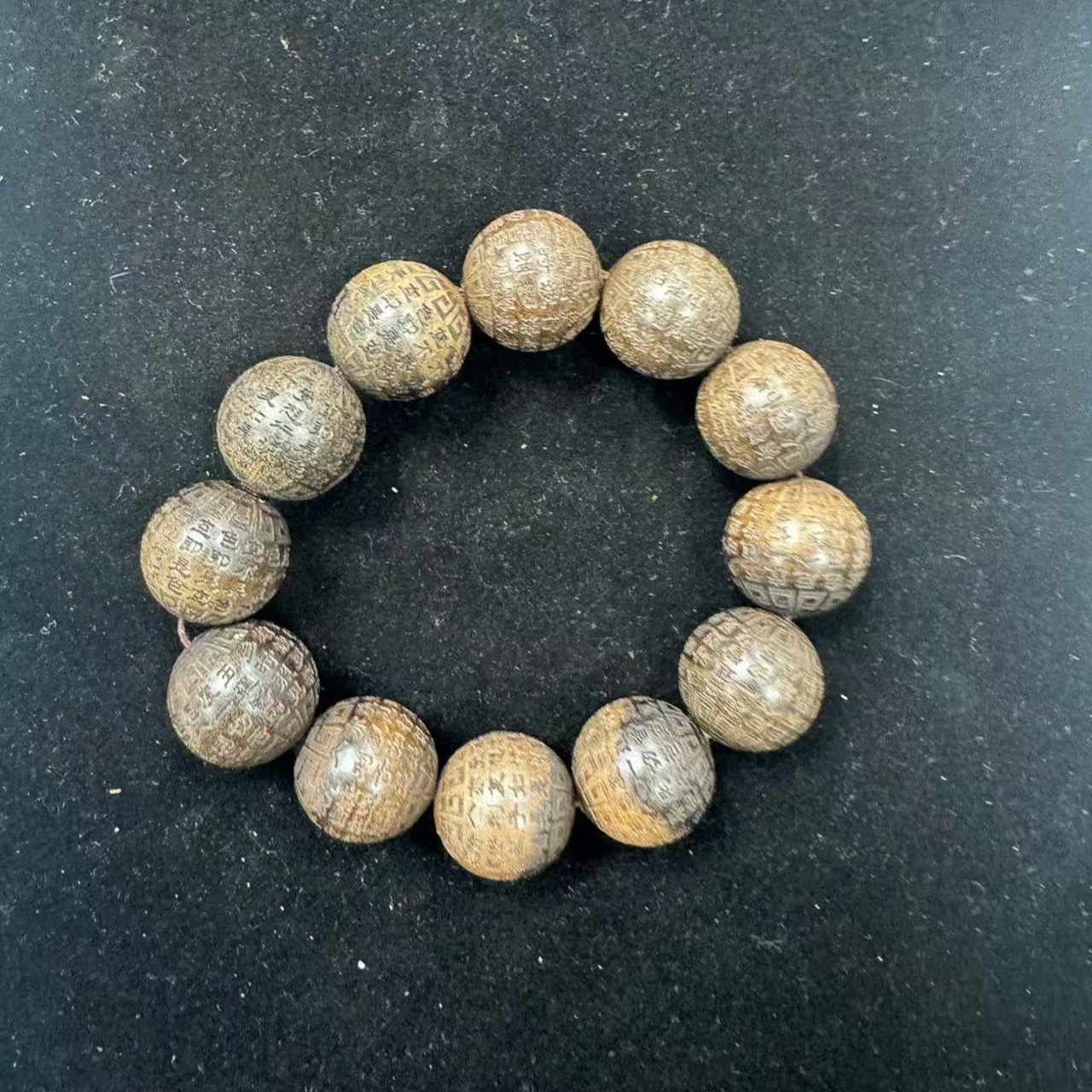 A100印度尼西亚雕刻文玩手串20mm