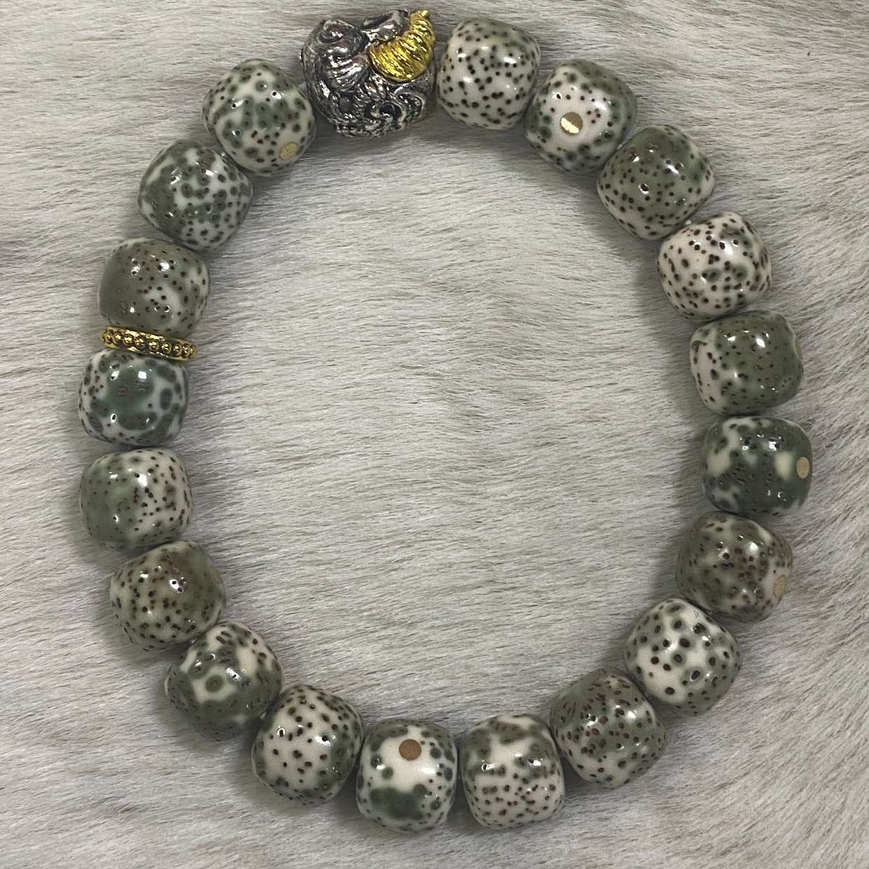 阴皮金标星月8*9+醒狮手串【1418】