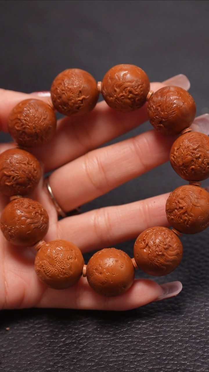 手串橄榄核2.0+/正圆光珠穿云龙