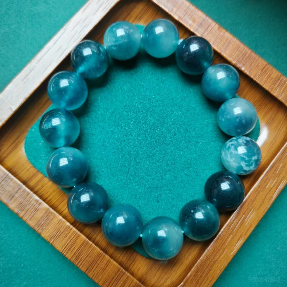 A1355蓝水乌鸡飘花手串 珑