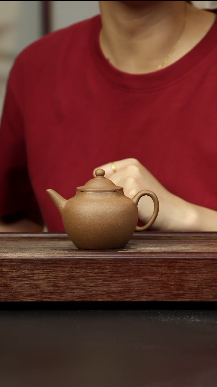 紫砂茶壶芝麻绿笠帽水平
