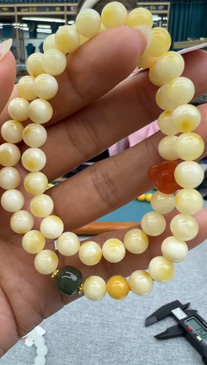 未镶嵌琥珀手链252秒拍号假一罚十