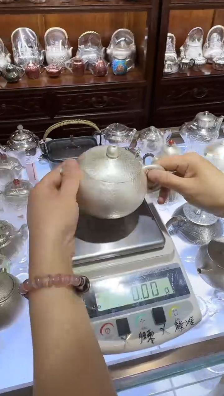 【闪购商品】足银999锤纹素雅经典西施泡茶壶大号