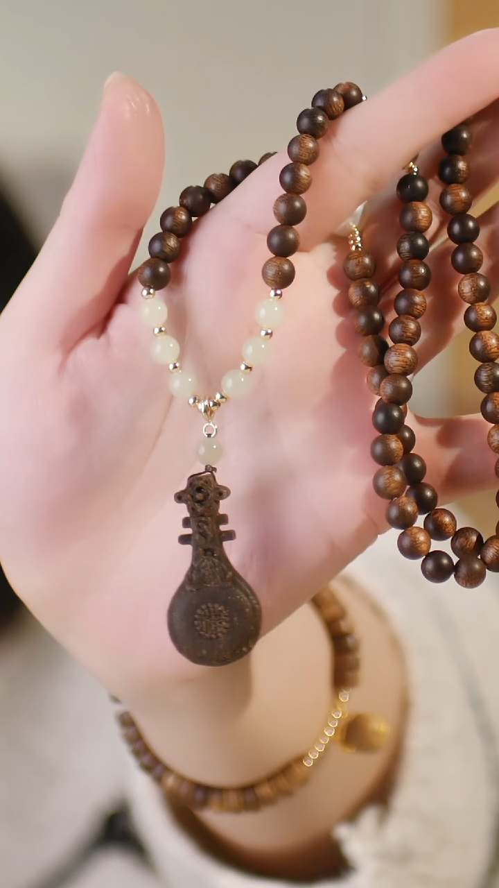 （三圈白奇楠0.6全沉+琵琶吊坠）