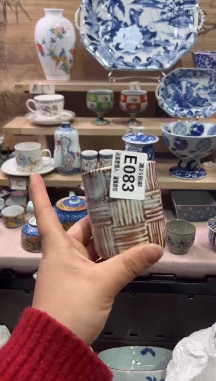 瓷片倚***石             E083