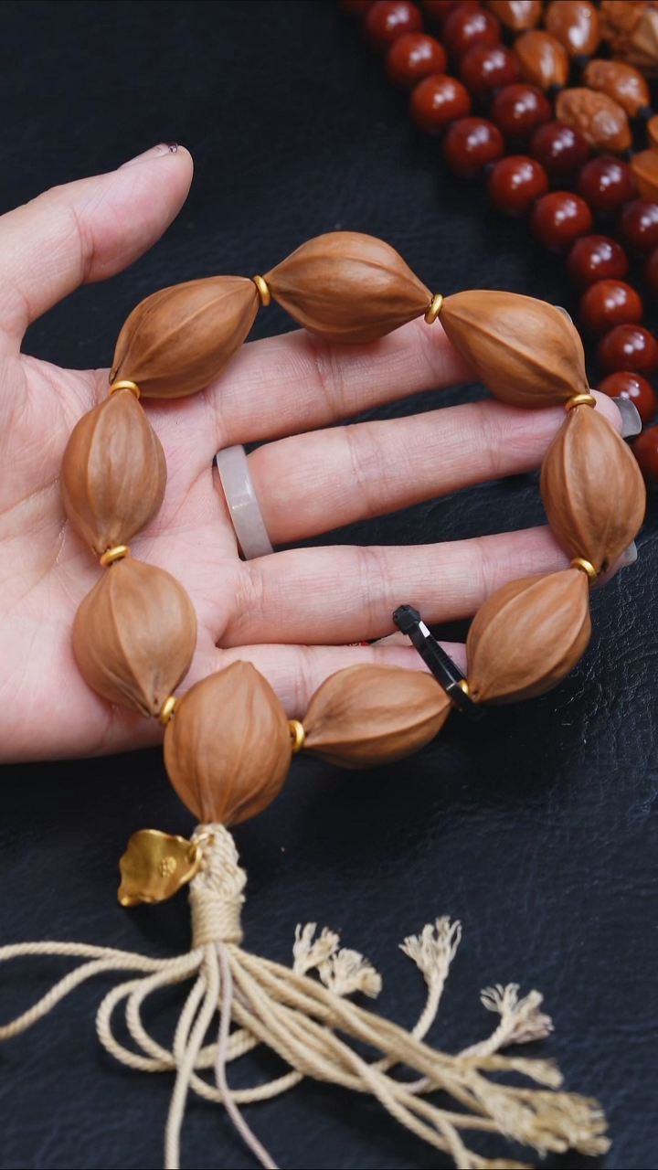 吊坠橄榄核2.3四花手串