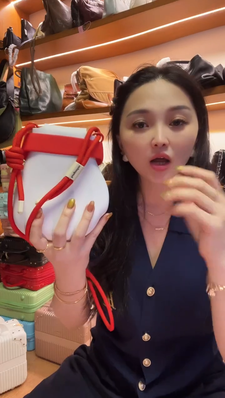 犏牛皮（革）珊瑚店清斜挎包真皮包时尚百搭包包(手机包）