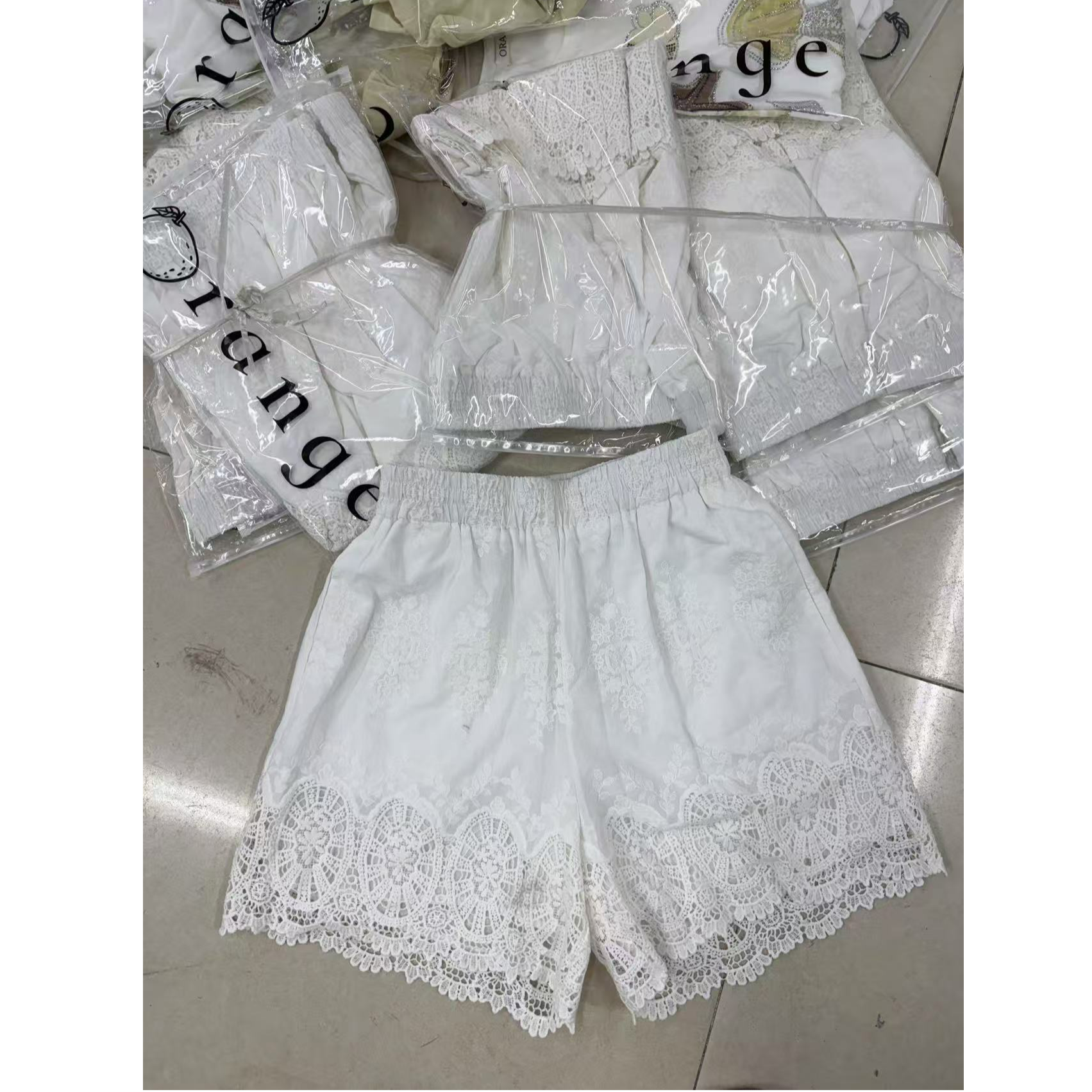 十三行Orange-夏季福秒蕾丝下摆百搭短裤#50078