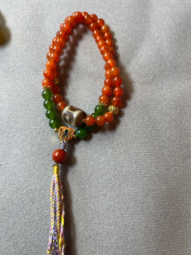 藏地朵朵玛瑙手串