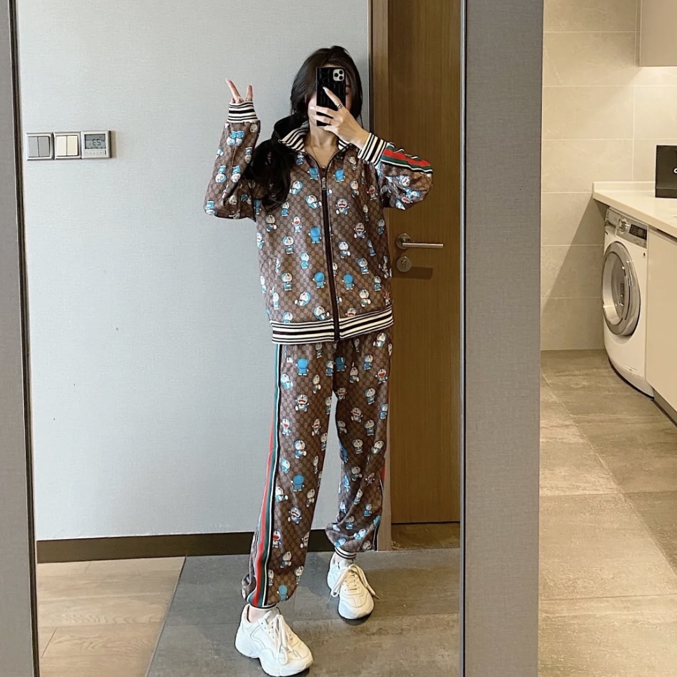99新 GUCCI/古驰 棕色联名机器猫长裤