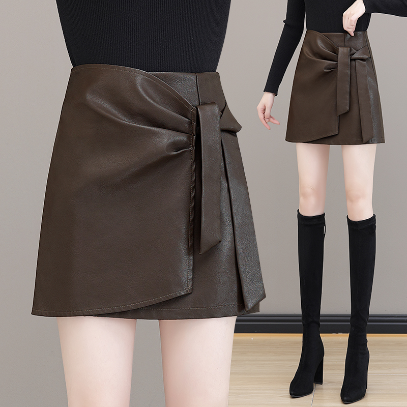 pu皮短裙女秋冬2023新款设计感高腰显瘦a字裙时尚绑带包臀半身裙