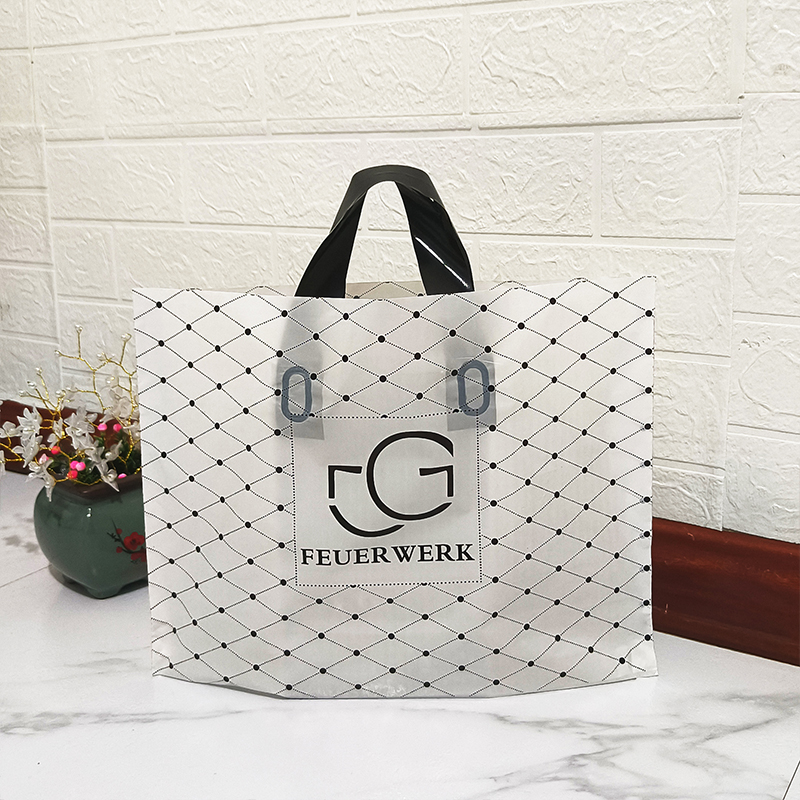 服装店购物袋高档时尚简约包装袋塑料袋装衣服手拎袋子定做logo