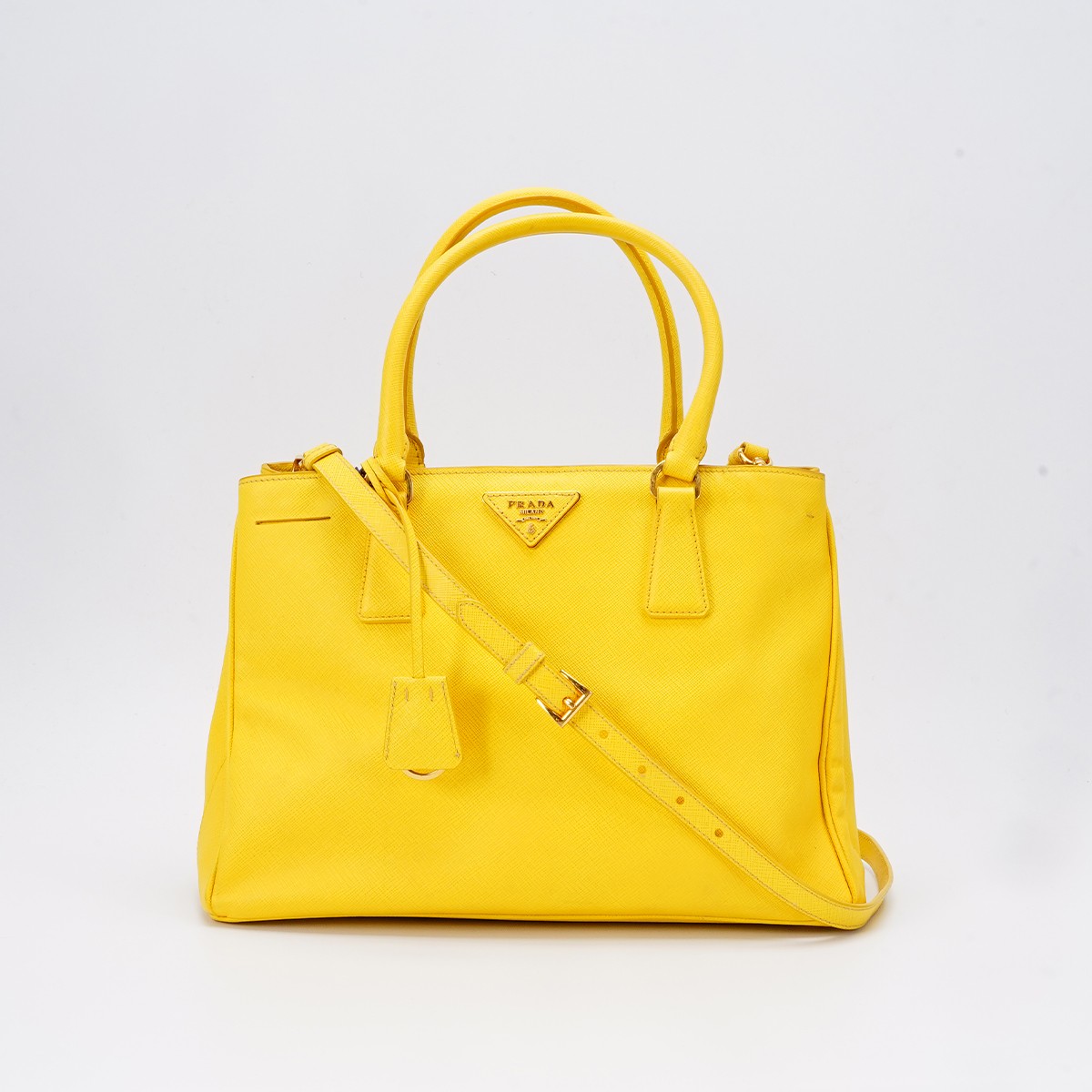 95新 Prada/普拉达 一口价【桔夕静文】杀手包中号黄色/BG22013464