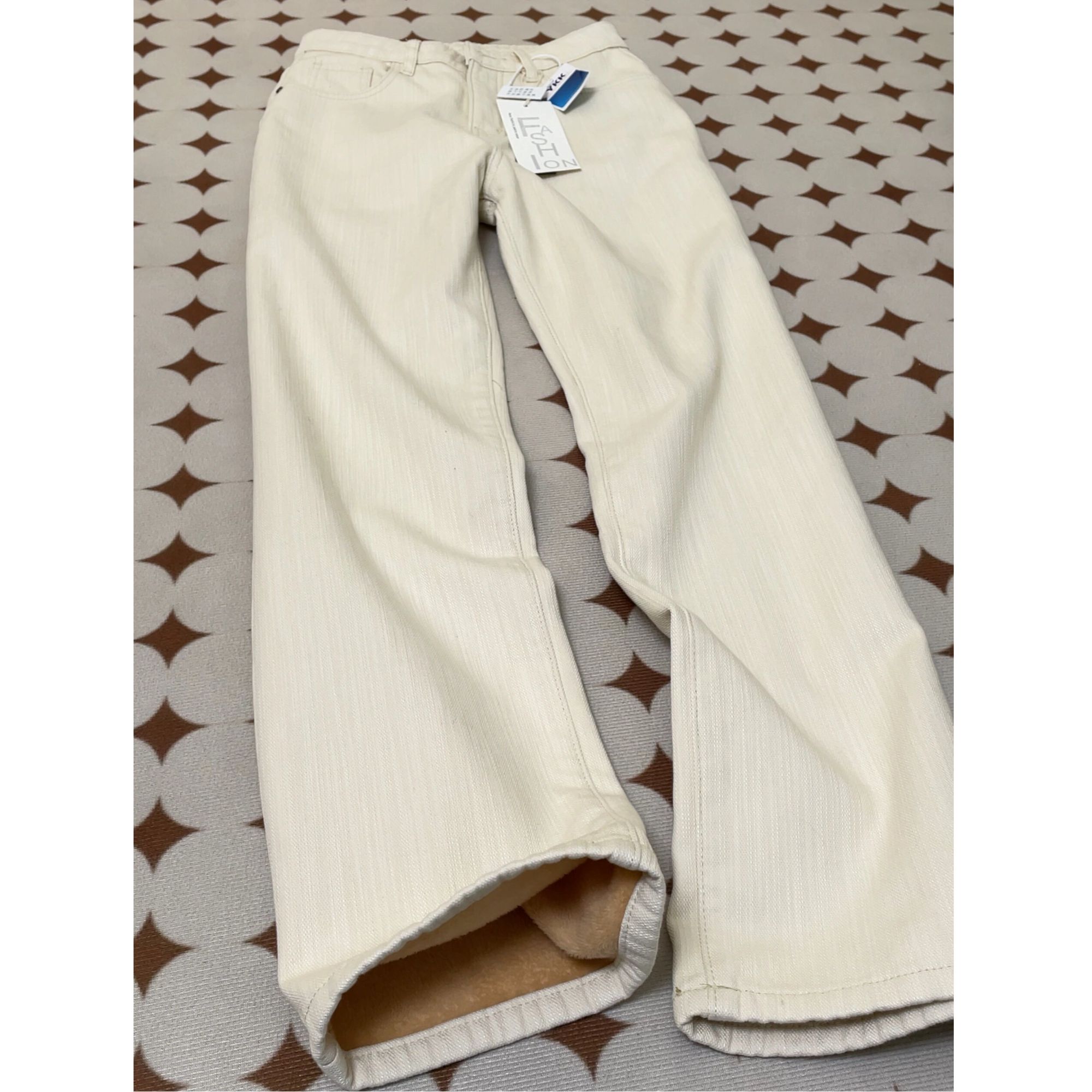 浅杏色宽松直筒牛仔裤女秋冬新款纹理设计感高腰显瘦窄版长裤