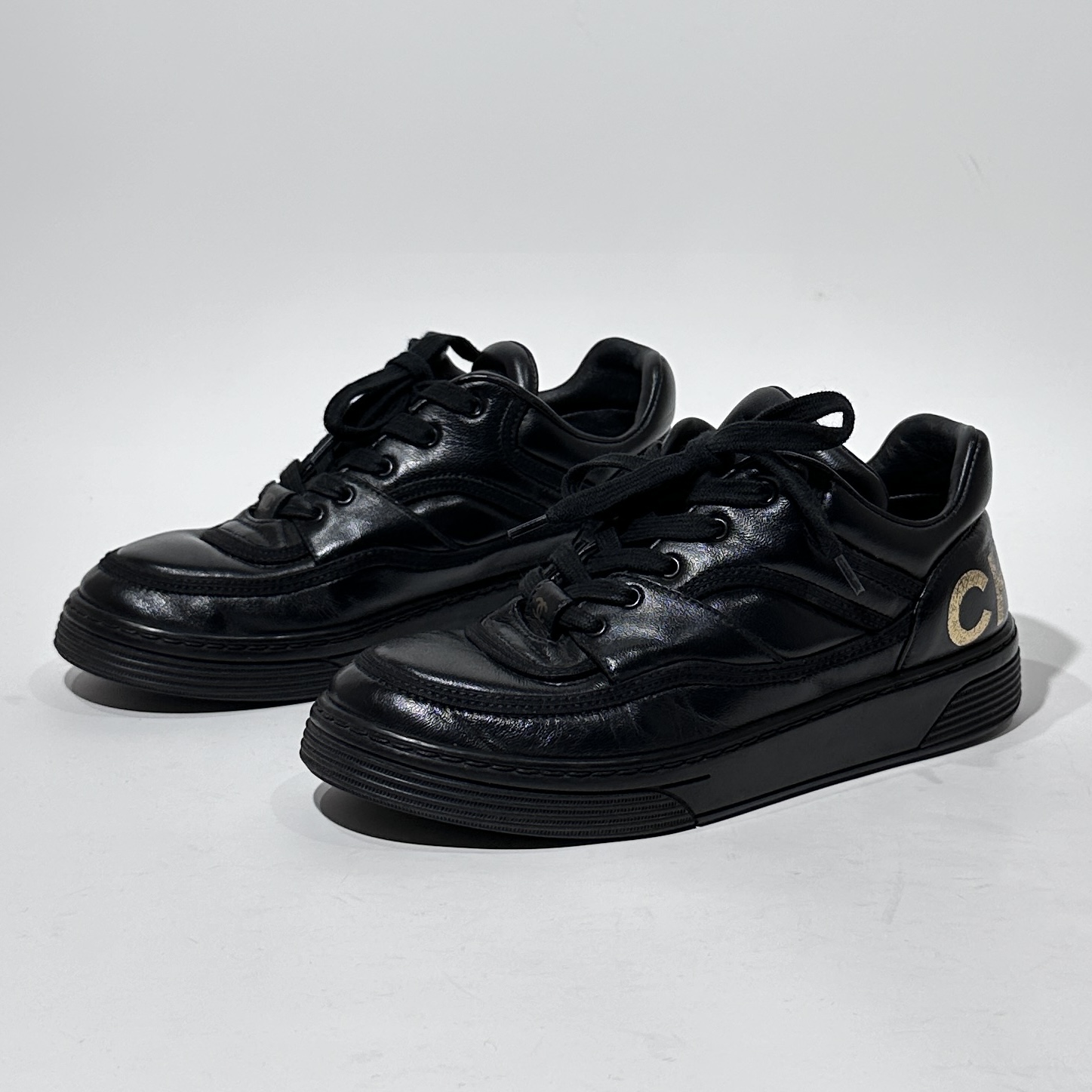 95新 Chanel/香奈儿 36.5码 黑色时尚板鞋/WX01357