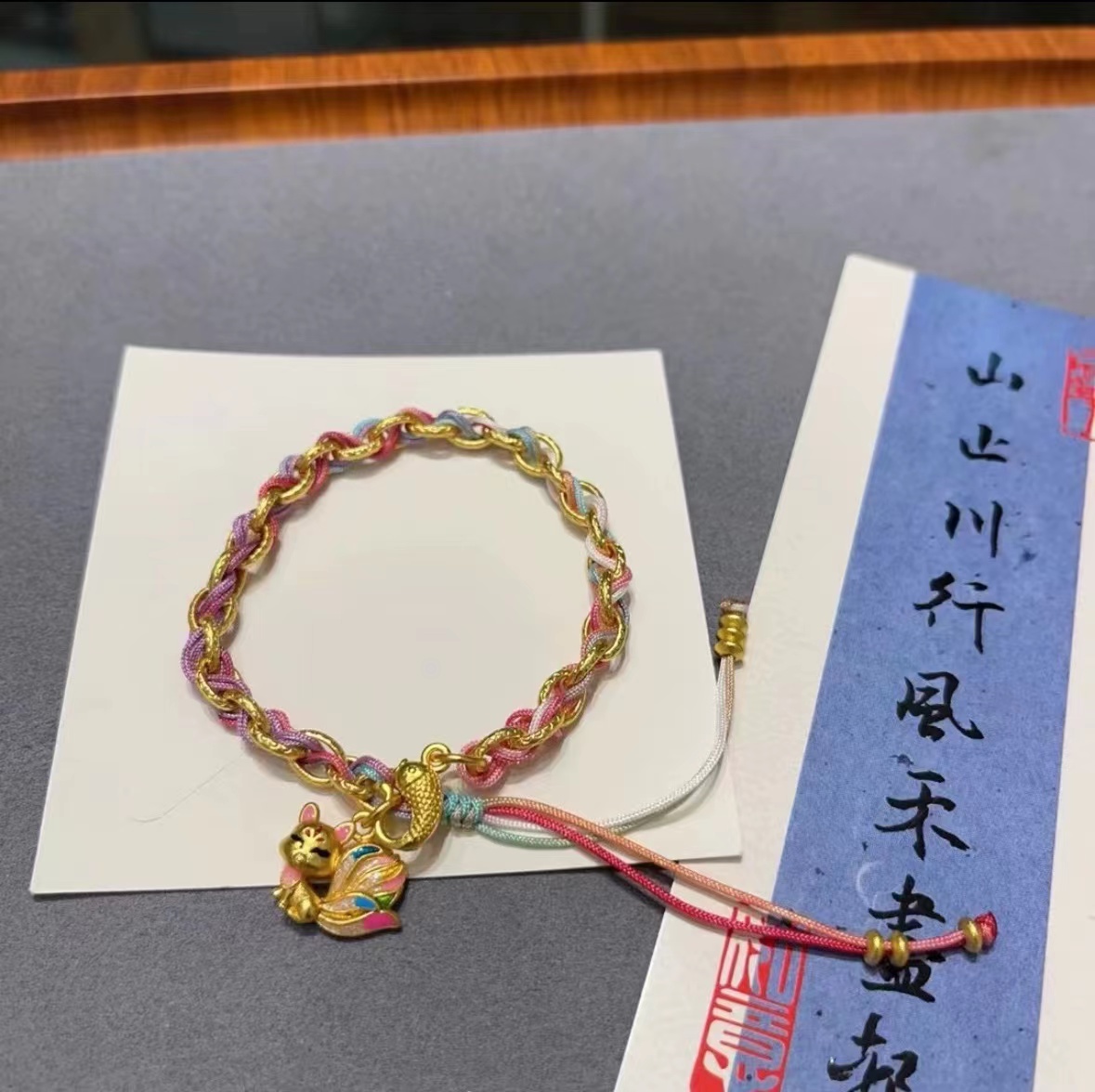 铜合金布艺手链 高保色爆款新中式招财狐狸面具五彩编织手绳