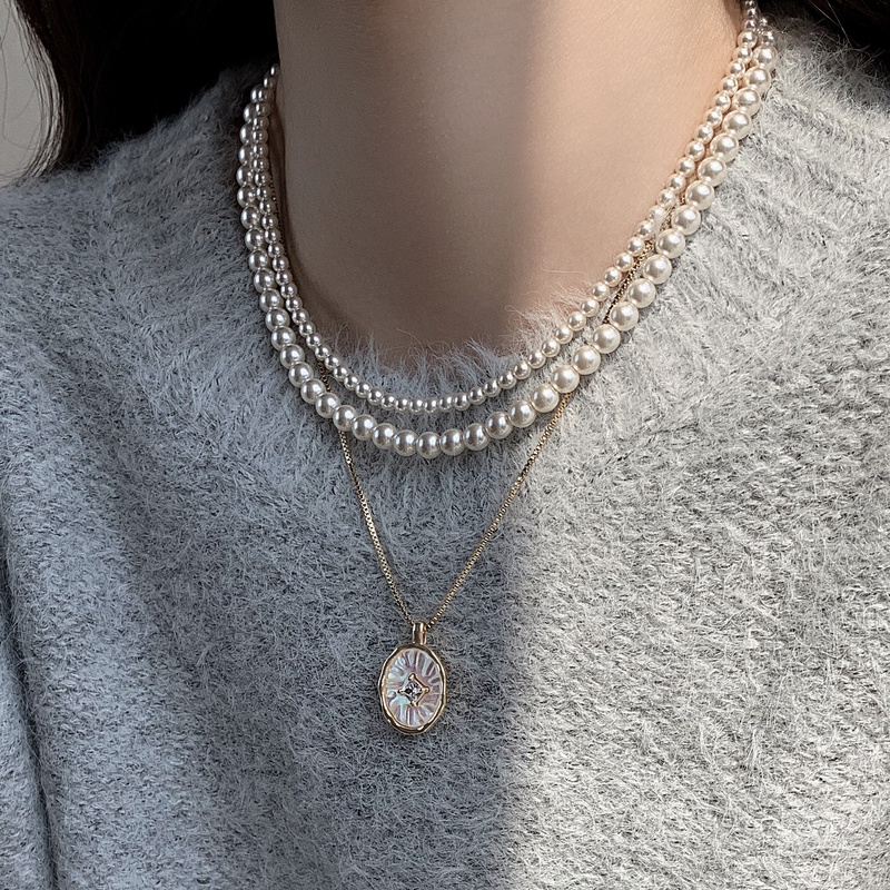 铜合金项链 贝母星芒项链法式高级圆吊坠项链轻奢毛衣链女秋冬