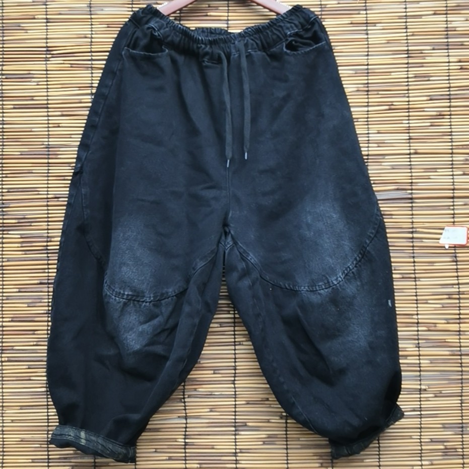 HY    608黑色膝盖分割线牛仔裤