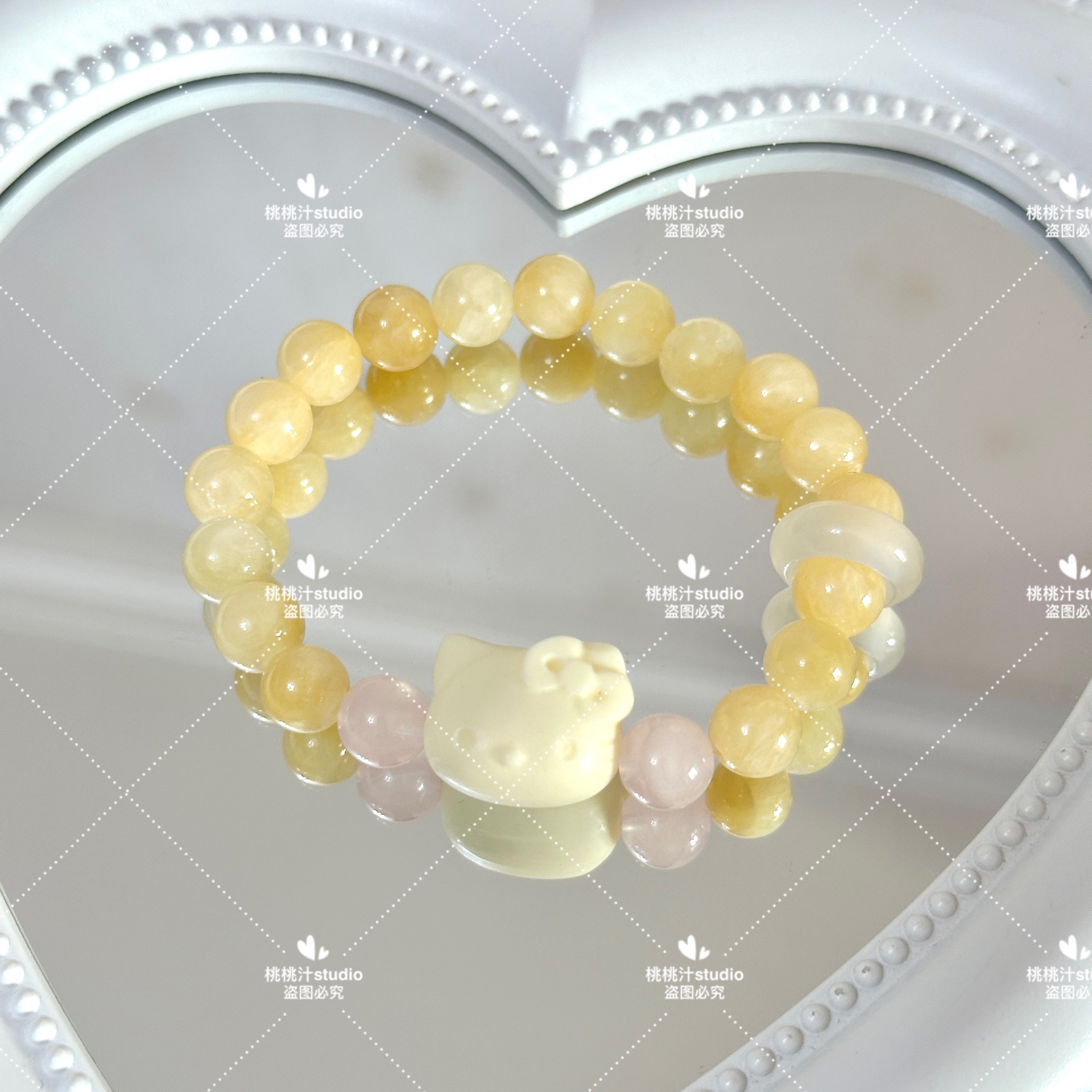 【芒果奶昔】牙牙kt天然米黄玉粉晶手串