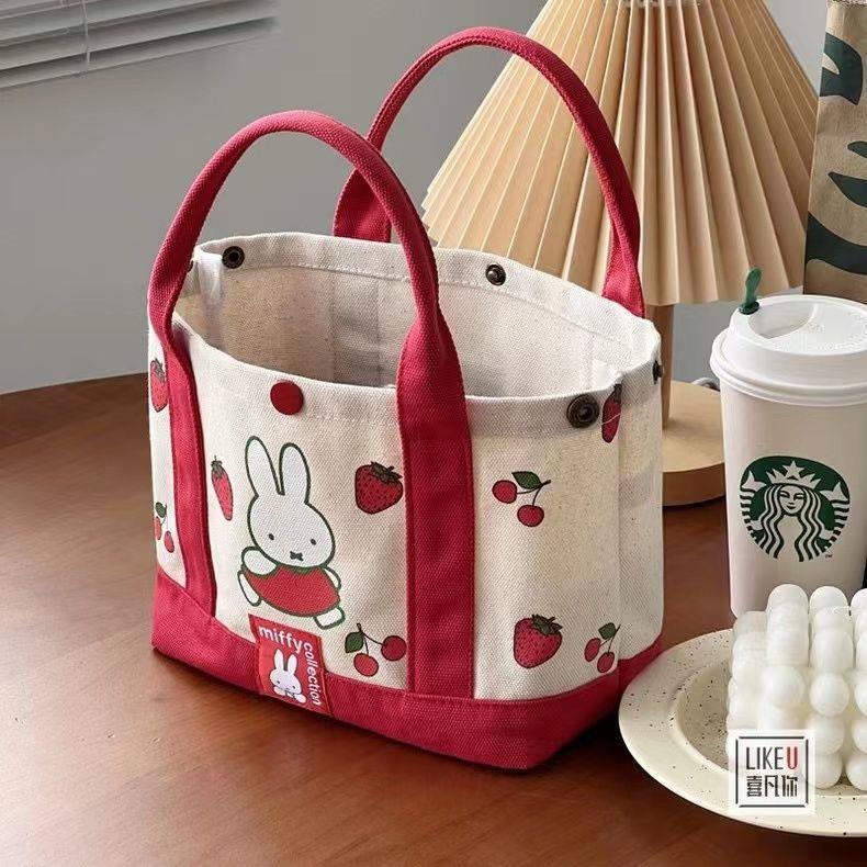 新款兔年帆布包夏日草莓印花手提包可爱手拎小包日常百搭通勤包包