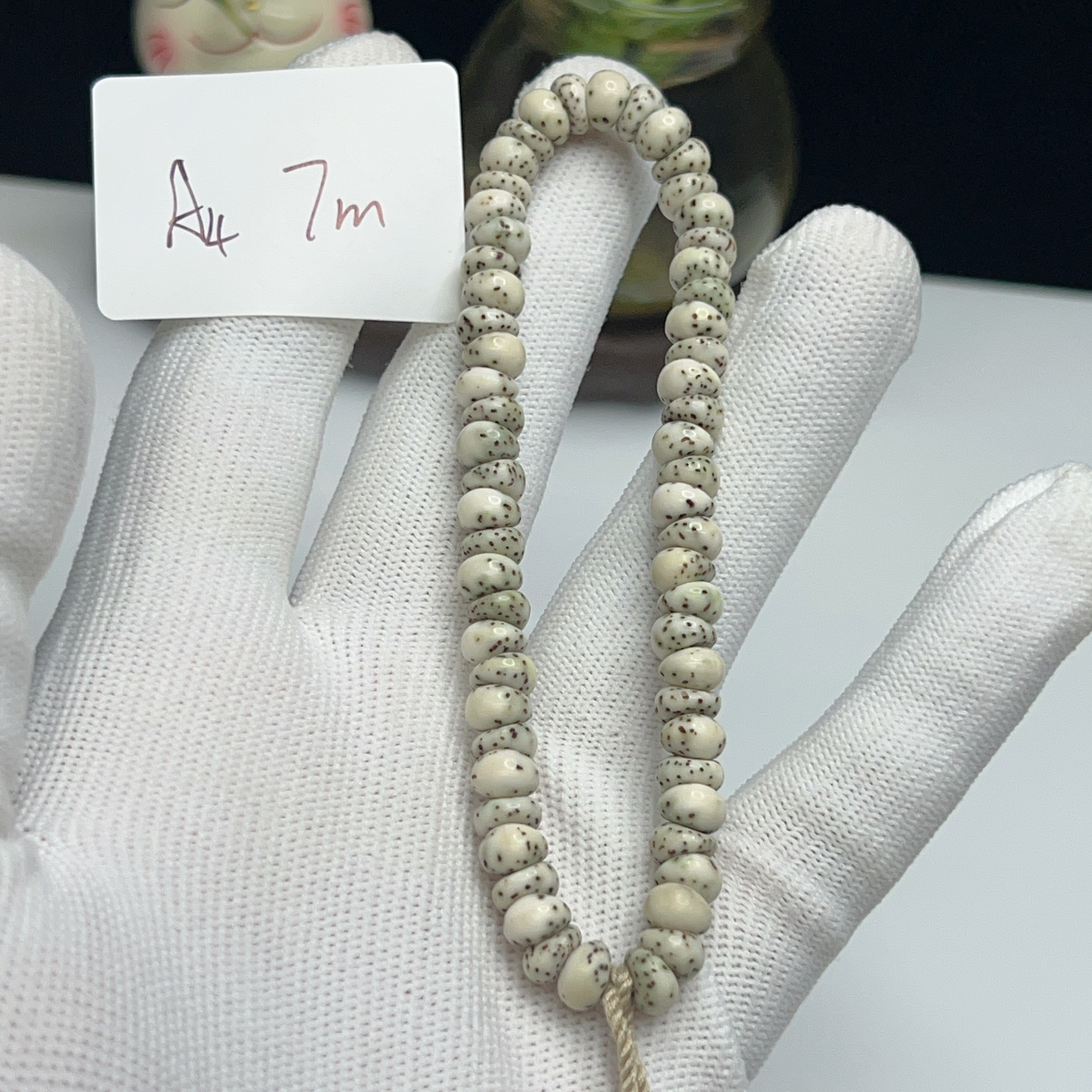 A4蒜瓣猪大肠7mm大留白手持款60颗一物一图星月菩提手串