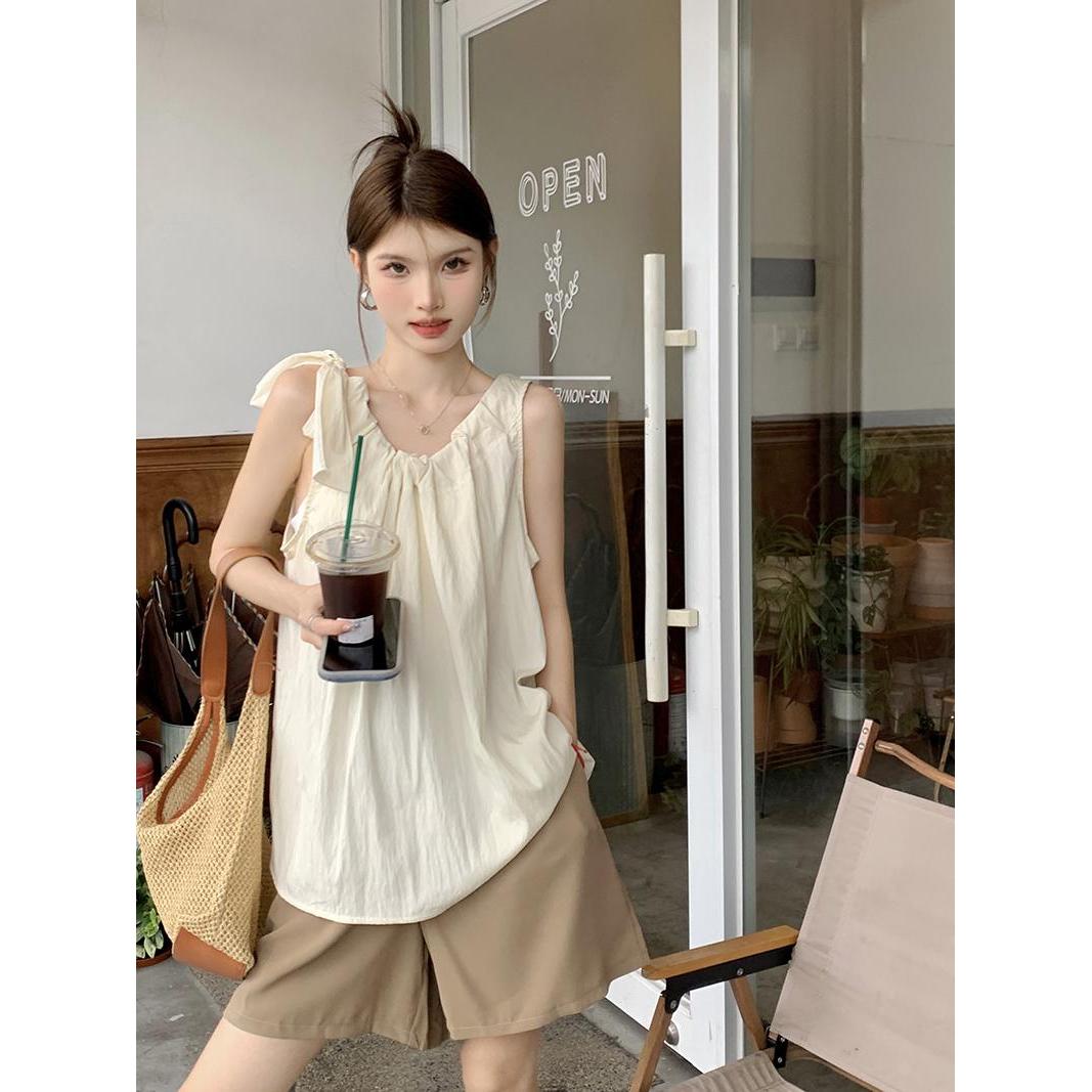 法式温柔吊带背心内搭女装2024新款宽松夏季度假气质外穿杏色上衣