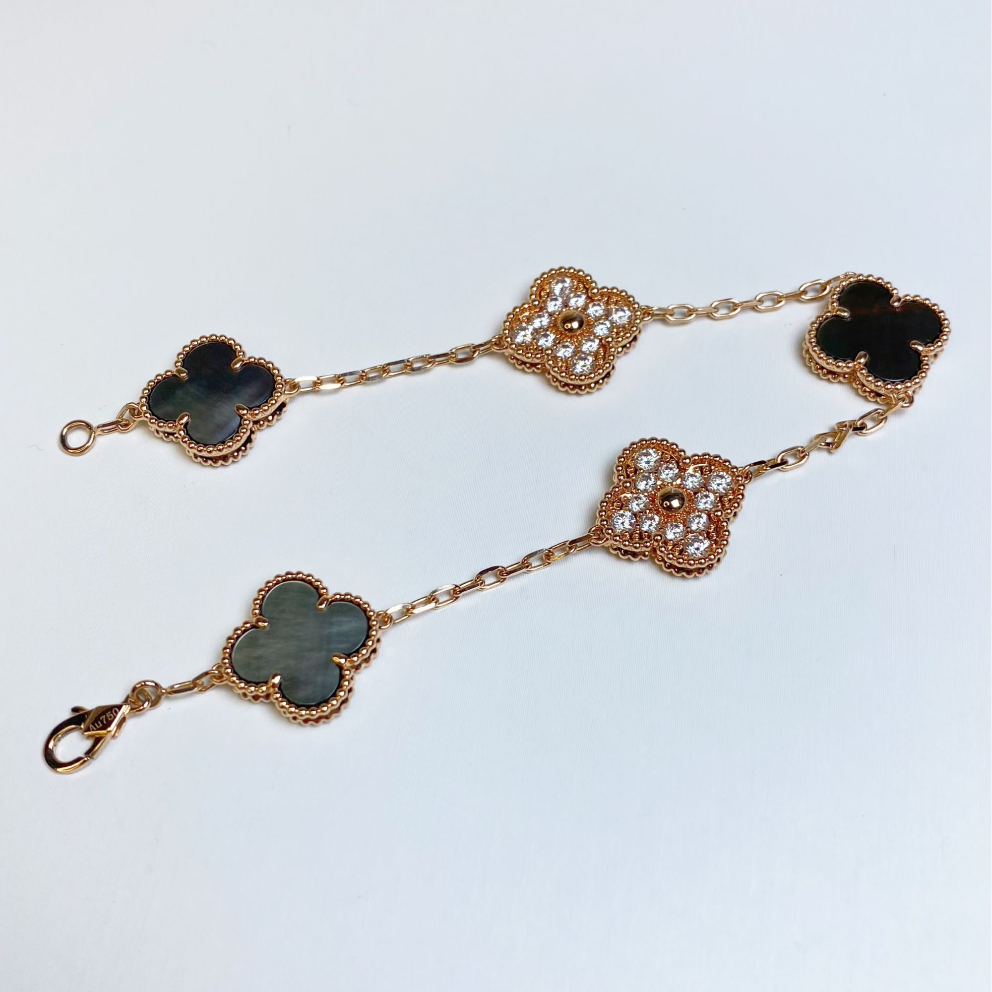 18K玫镶莫桑3+2灰贝15mm四叶草手链