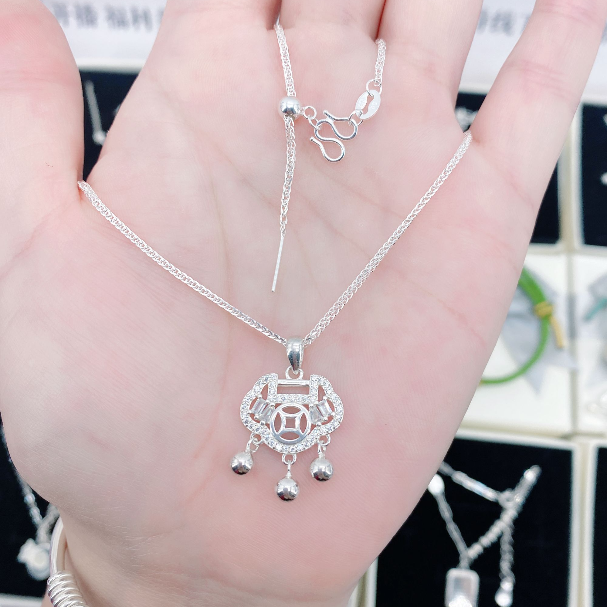 坠链均足银合成锆石 足银999肖邦银项链 纯银招财金钱锁吊坠 