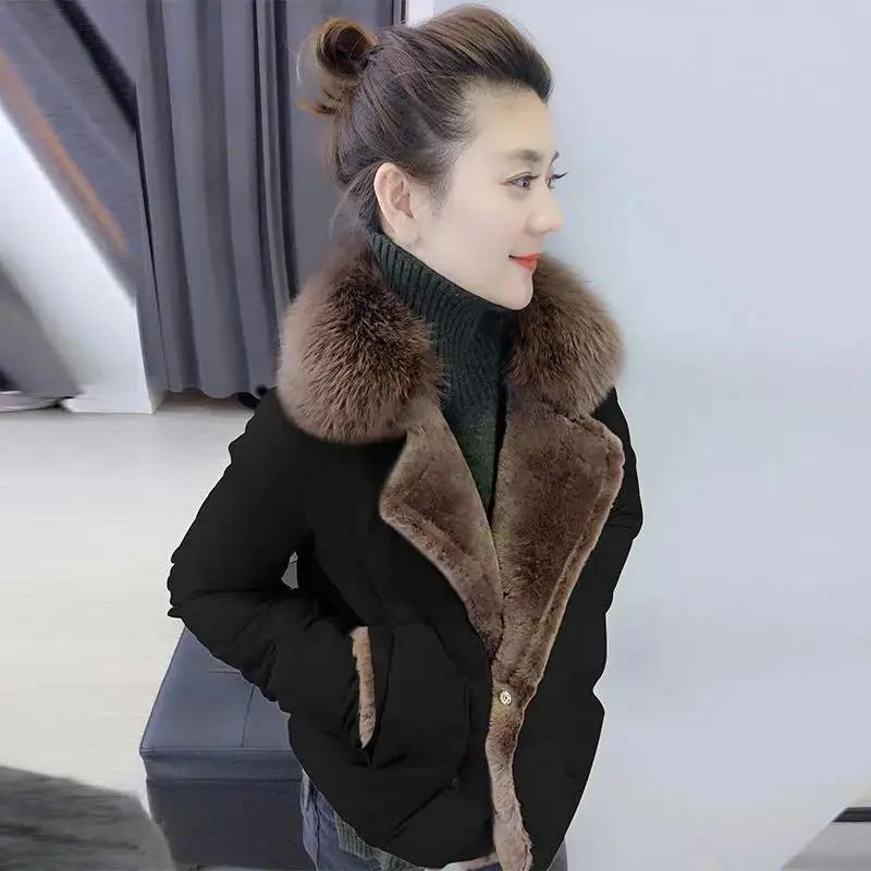 冬装女2023新款欧货大毛领翻领修身时尚轻薄茧型羽绒