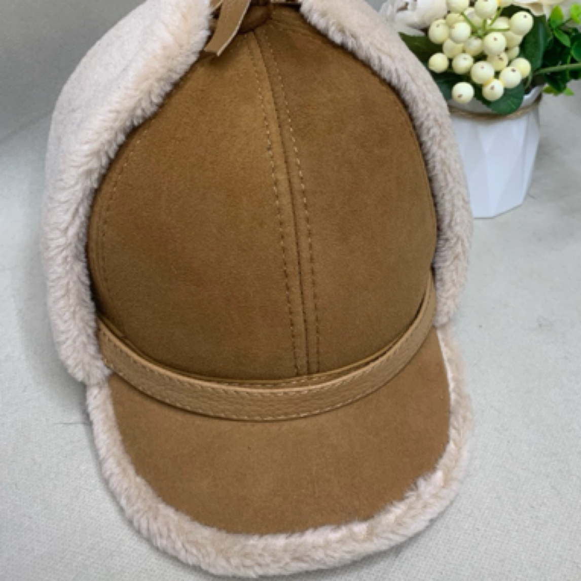 冬季羊皮帽子男士保暖护耳加厚真羊毛鸭舌帽中老年人加绒