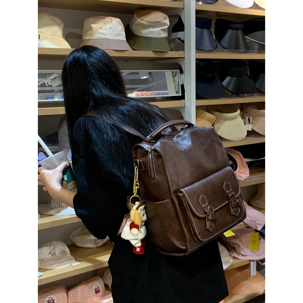 双肩包女2023新款复古英伦风大学生书包韩版简约时尚旅行背包新潮