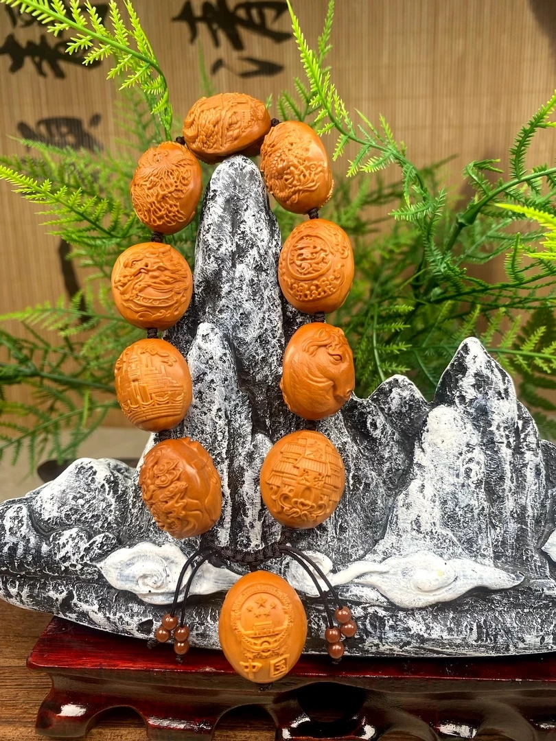 瑾亜，十大帝王橄榄核雕手串2