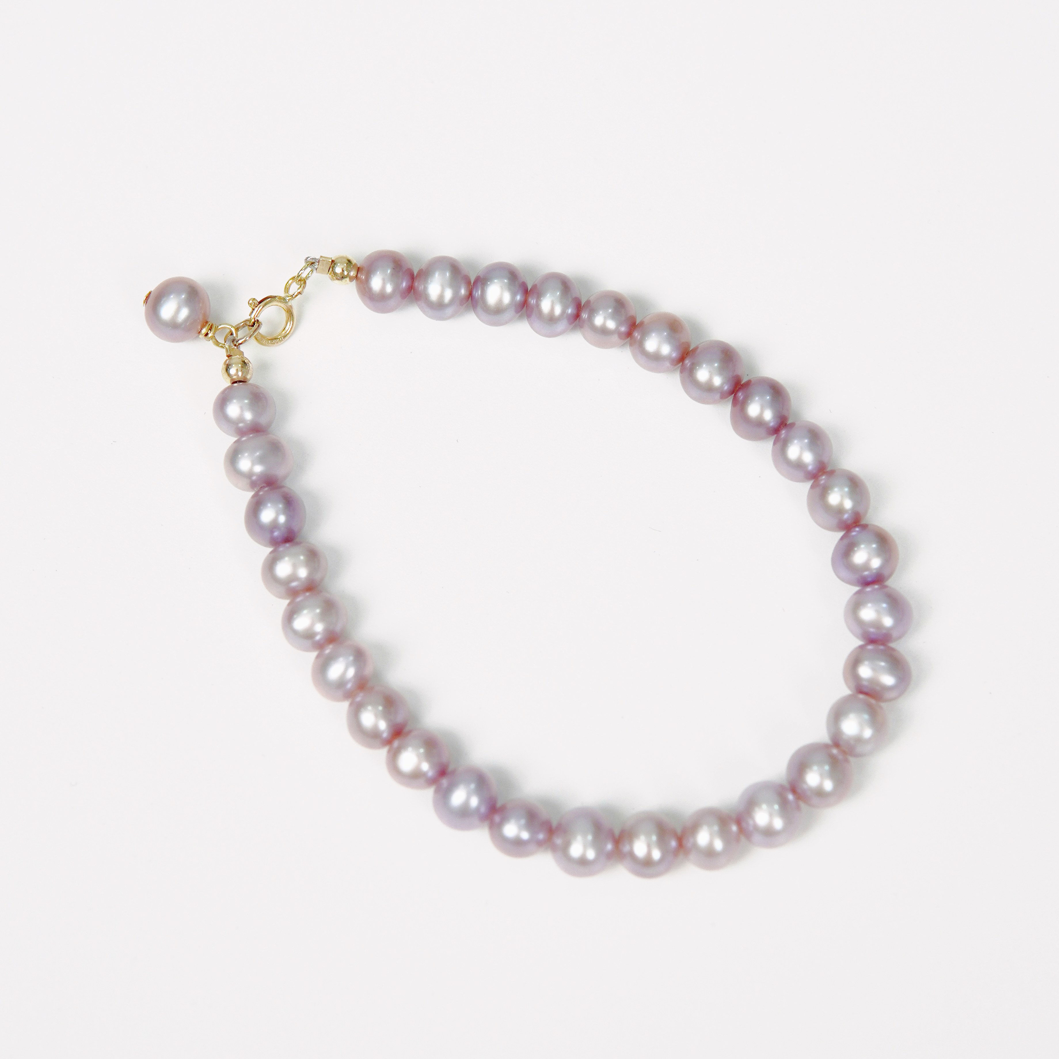 紫色淡水珍珠手链不褪色注金弹簧扣5%黄金6mm左右近圆高强光无瑕