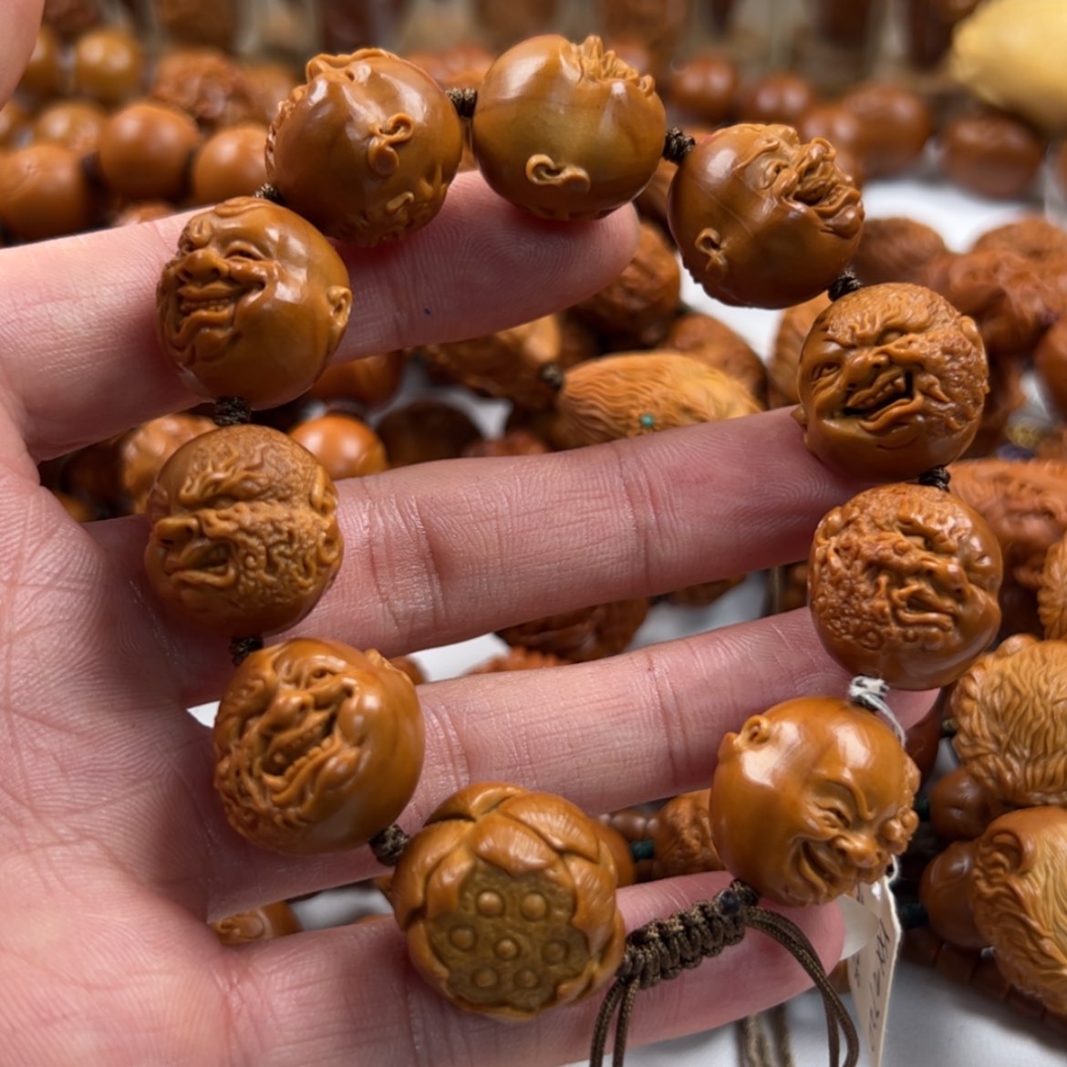 【闪购商品】橄榄核核雕_****O冯。佛魔一念