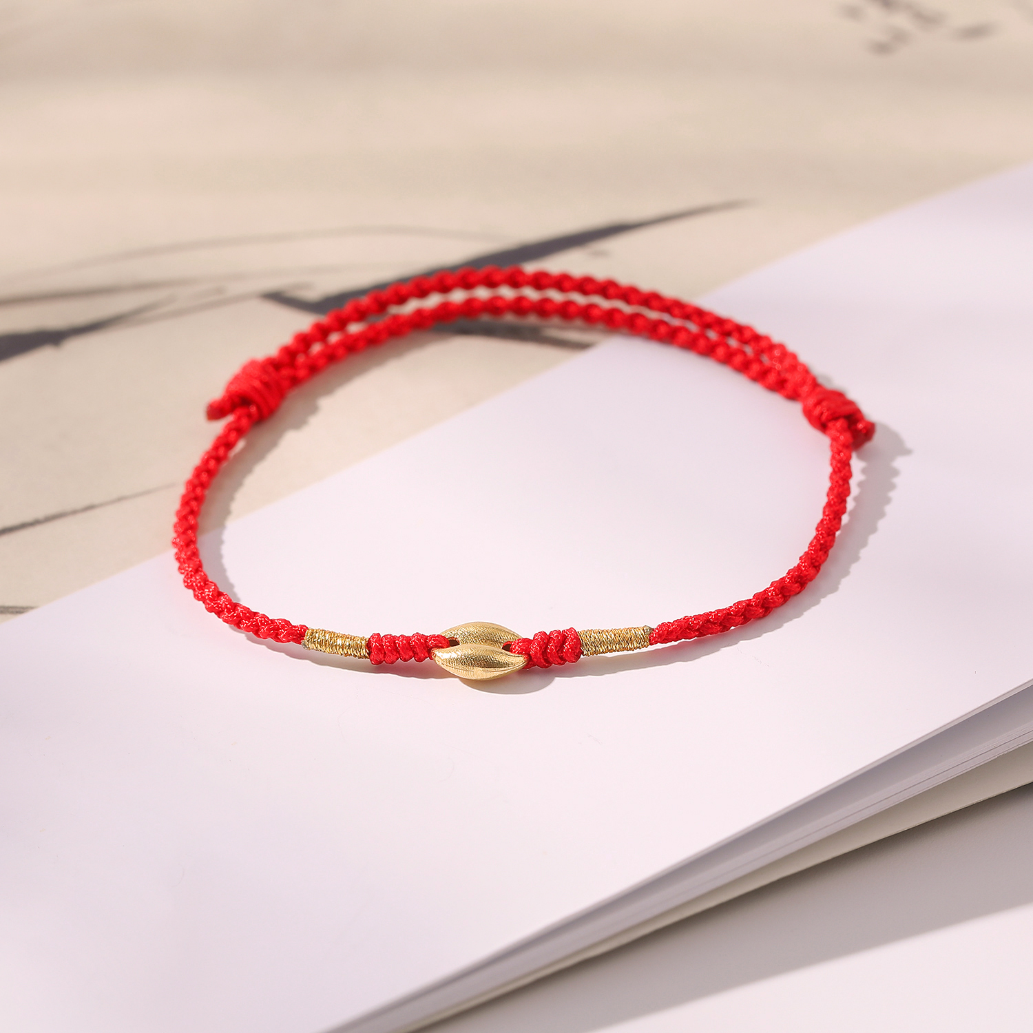 一了个卜【喜至庆来】18K金猪鼻子编绳手绳