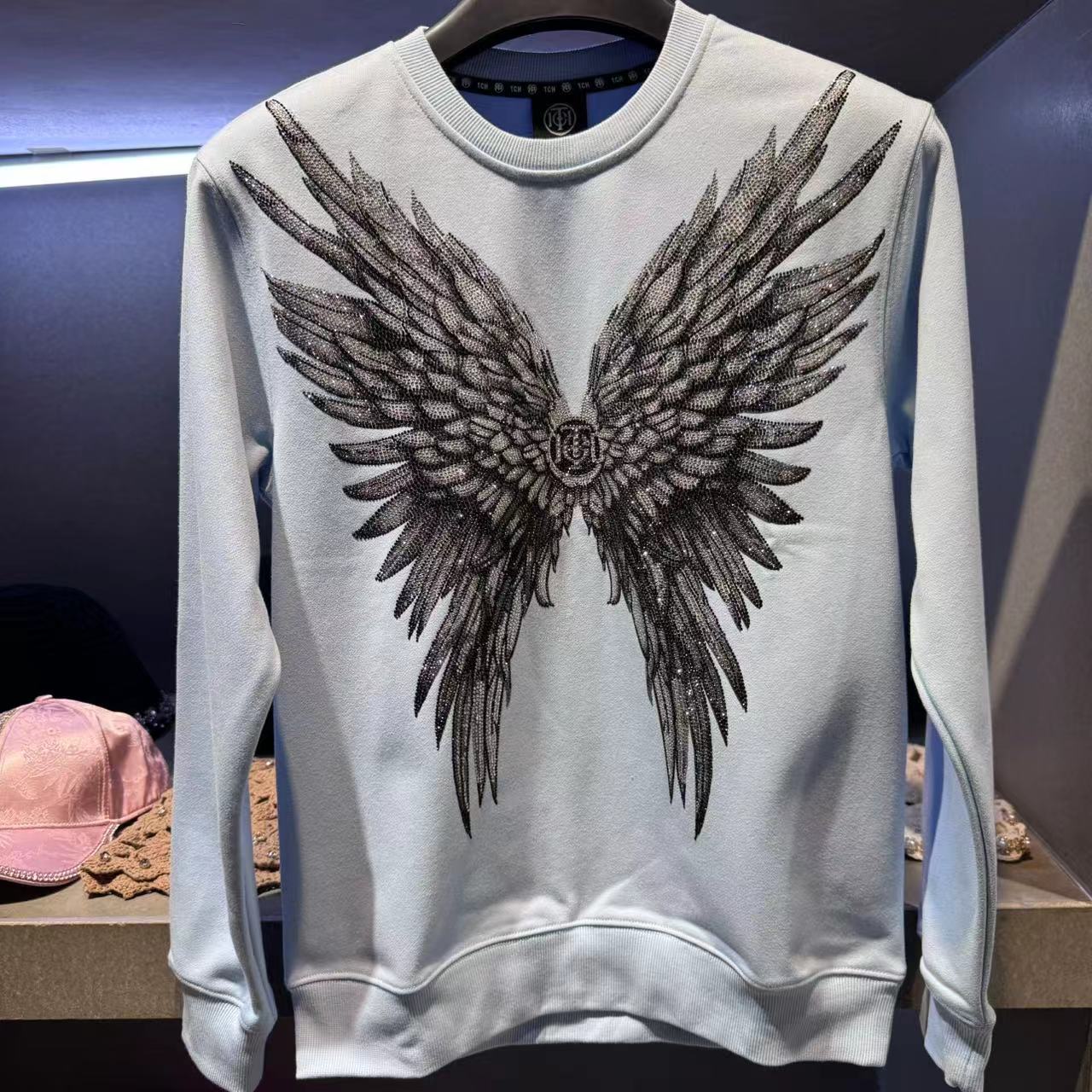 TCH服饰店播-烫钻翅膀时尚潮流圆领衫T69D116082