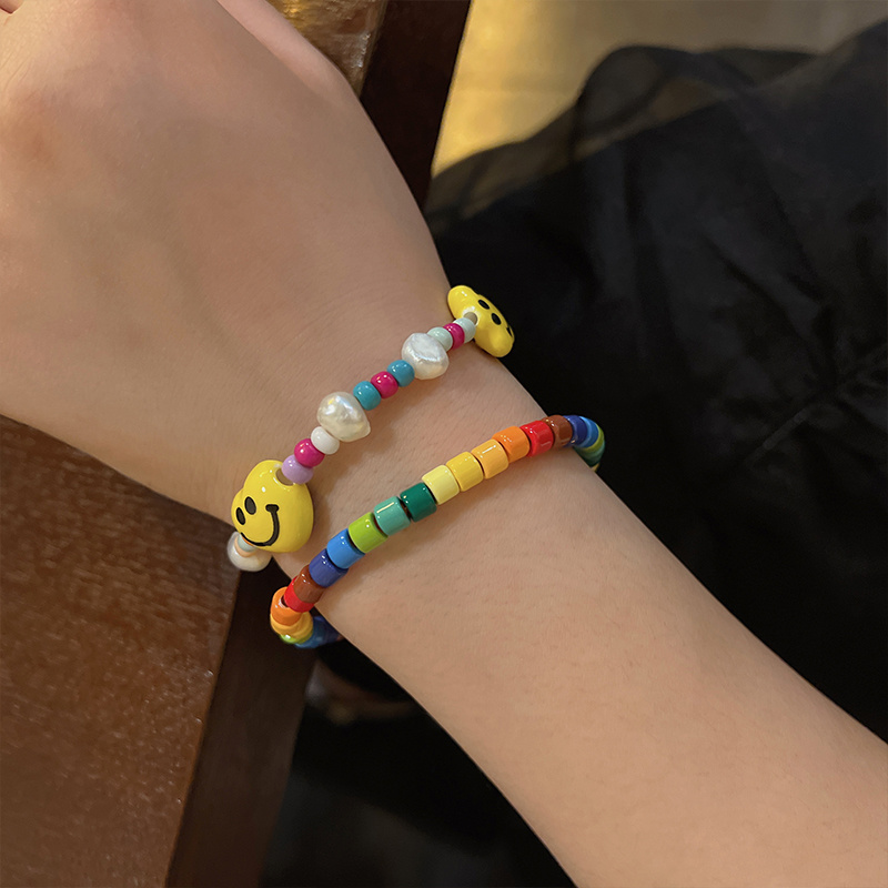 oushipei/欧诗佩 仿珍珠手链 笑脸爱心拼接手链女彩色串珠手饰女