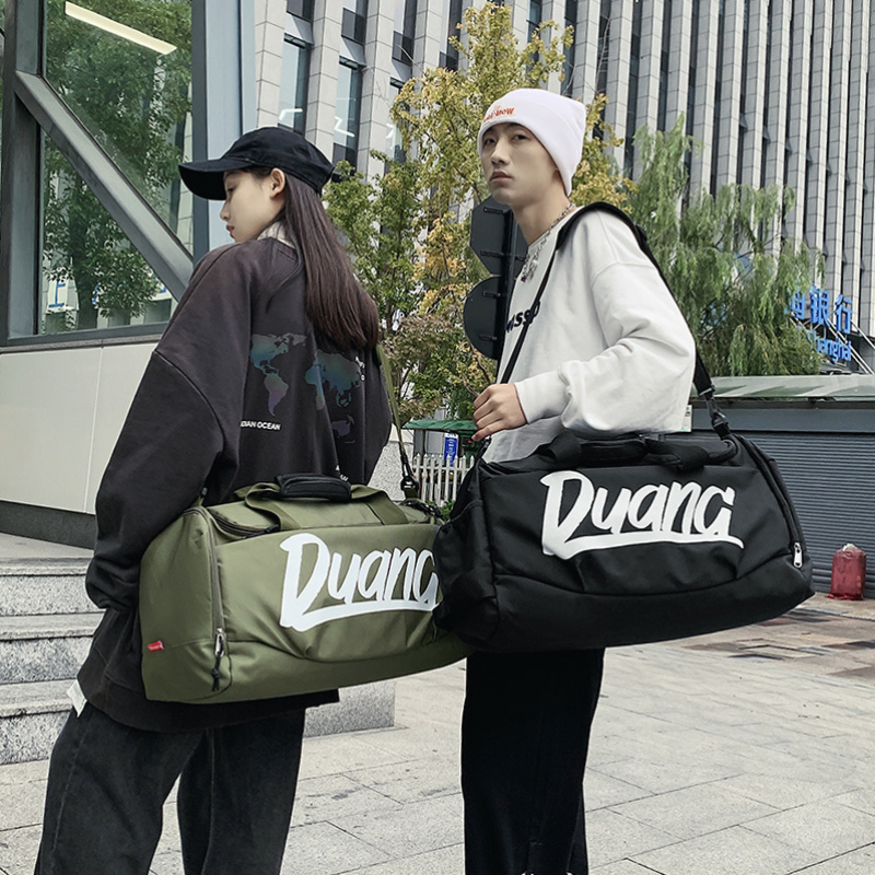 大容量手提短途旅行包女时尚轻便防水行李包男出差旅游收纳登机包