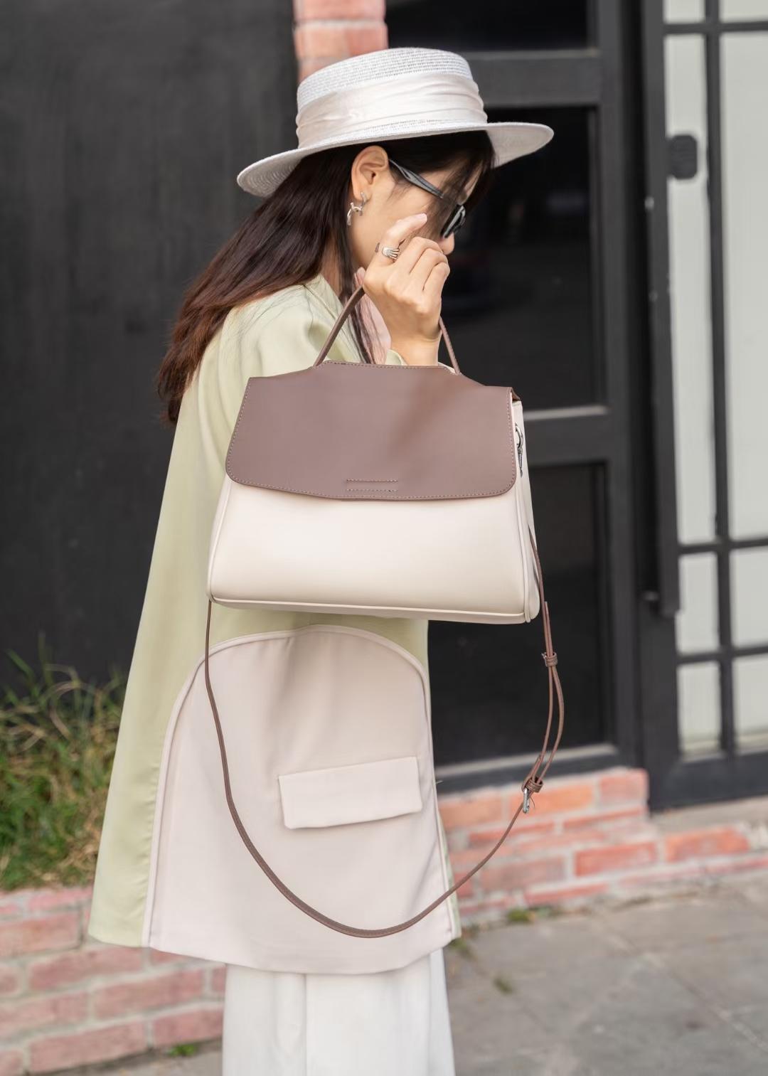 秋冬新款女式纯皮手提单肩斜挎托特枕头包