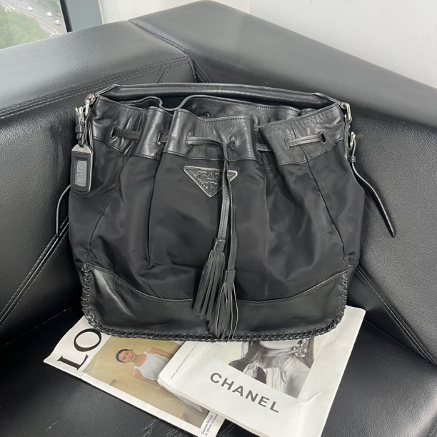 95新 Prada/普拉达 捐金沉珠/抽绳水桶包